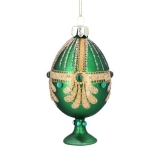 Green glass jewelled egg on stand